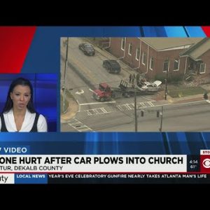 Car plows into church on Candler Road