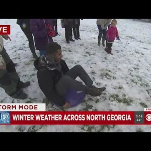 CBS46 reporter Allen Devlin goes sledding in North Georgia