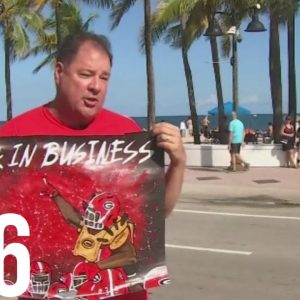 Football fans on the beach in Miami