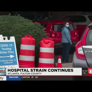 Hospitals continue to feel strain of COVID-19 surge