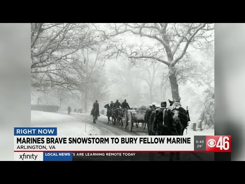 Marines brave snowstorm to bury fellow marine