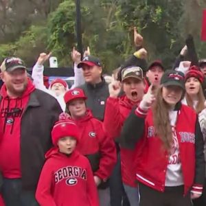 Dawgs fans line the streets of Athens for the UGA bulldogs Parade of Champions