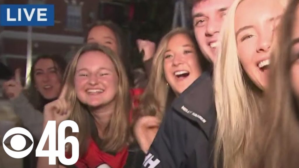Students and other college football fans excited about the big game